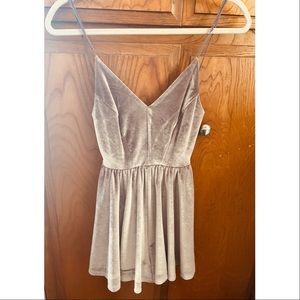 Urban outfitters romper, never worn. No tags. Purplish silver color